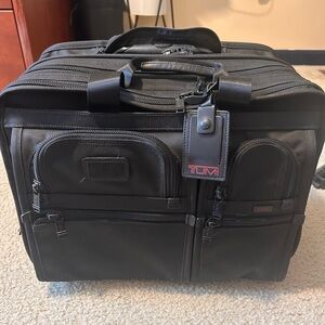 TUMI Black roller Briefcase with lock